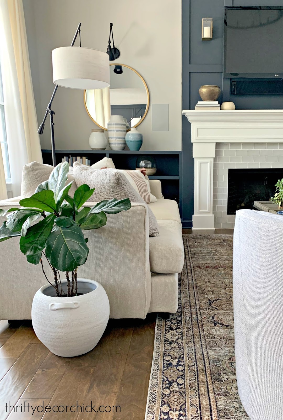 Dark fireplace and built ins light walls