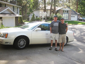 Mark and My Son with Mark's Cadallac he bought when he found out he was Ill...