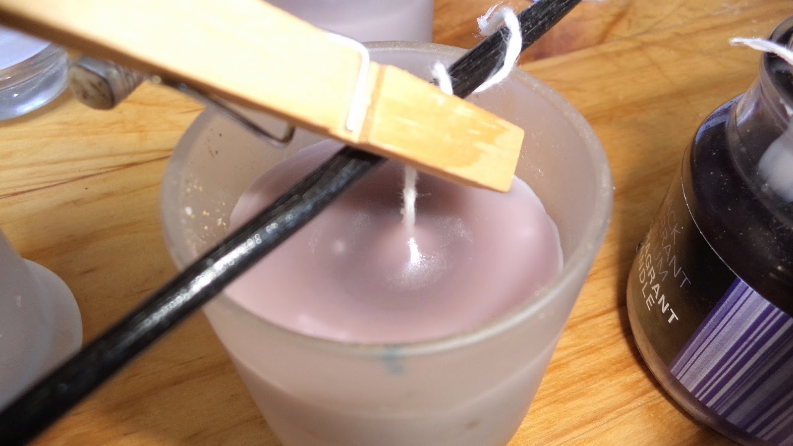 Refilling old candle holders with new home made candles!