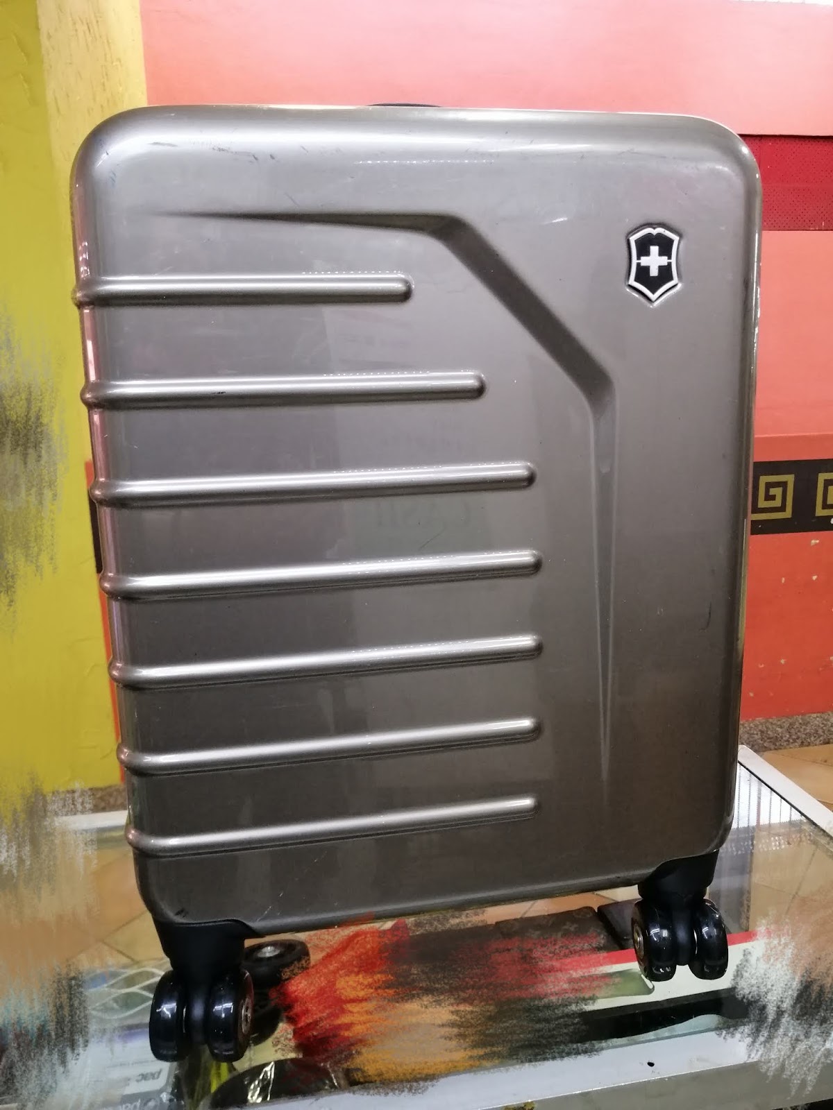 Victorinox bag repair, luggage wheel replacement, zipper, stitching