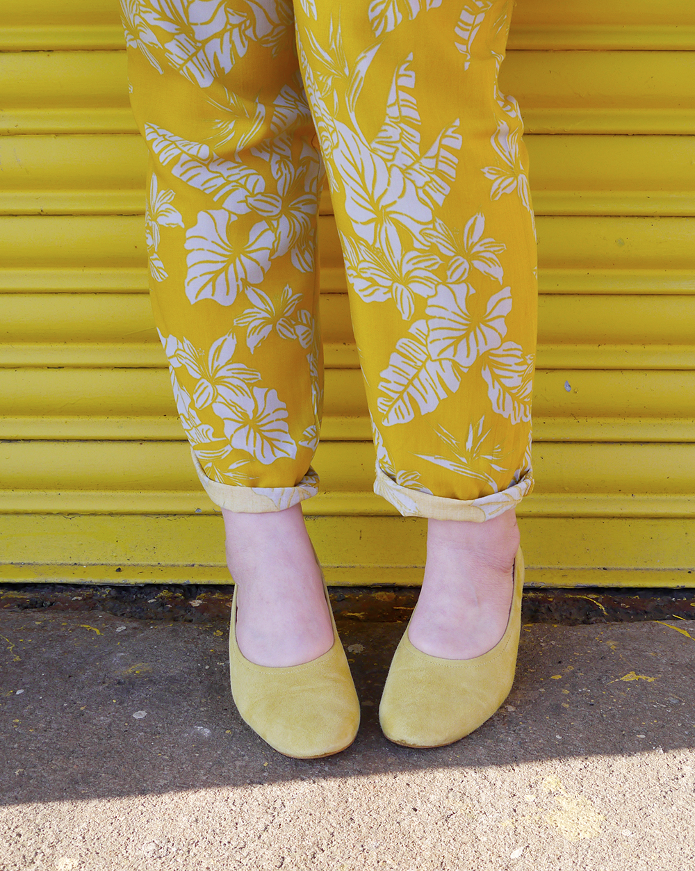 Sunshine style Helen from Wardrobe Conversations wears yellow Office shoes and tropical charity shop trousers