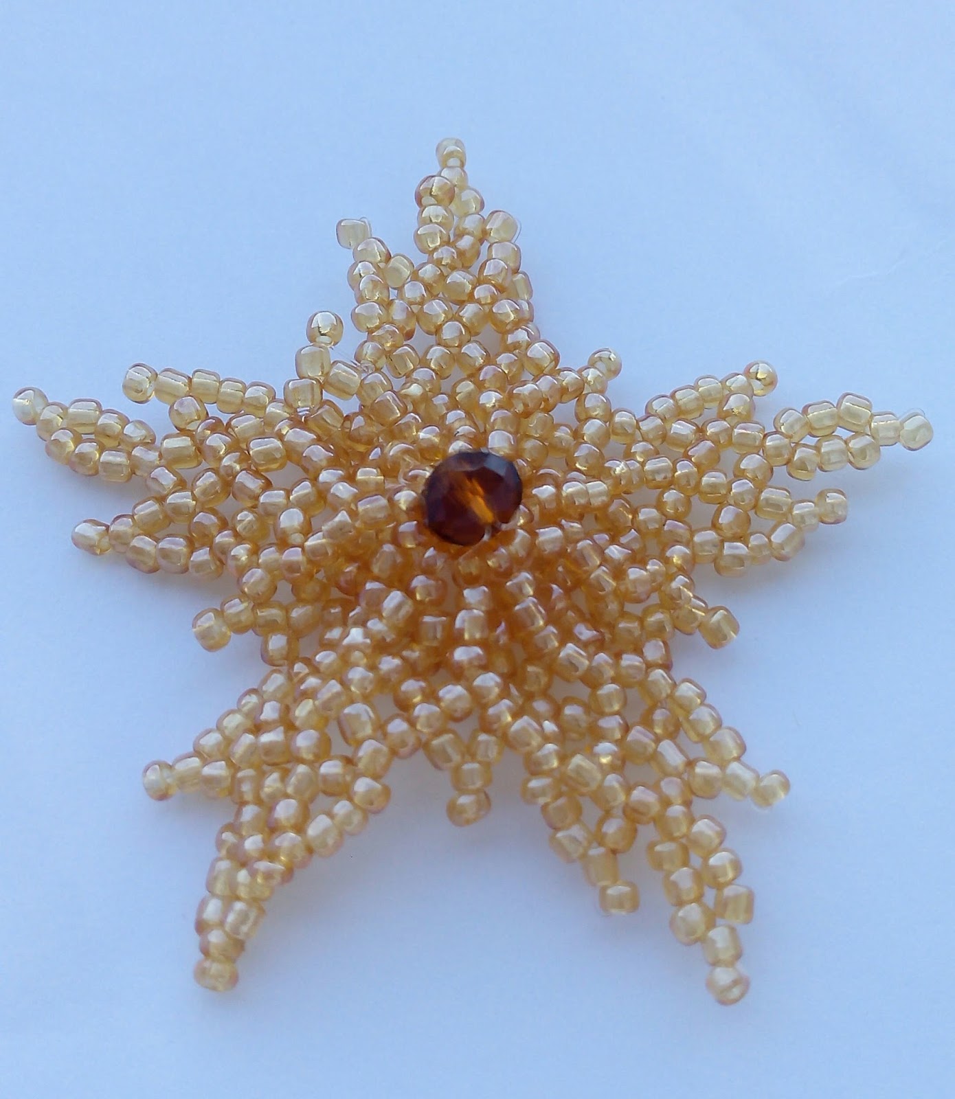 Beadination Beautiful beaded flower using the bead netting technique.