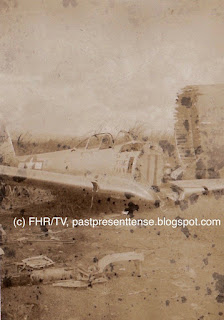Wrecked body and wings of World War 2-era airplane