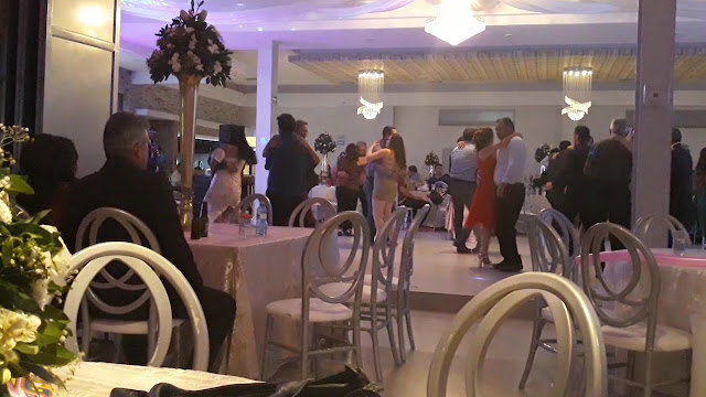 Guests dance at wedding