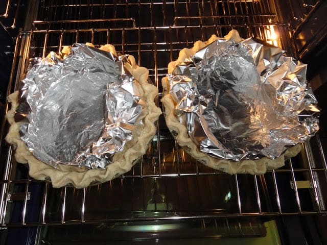 Cook Pie Shell Lined with foil for Butterscotch Pudding Pie.