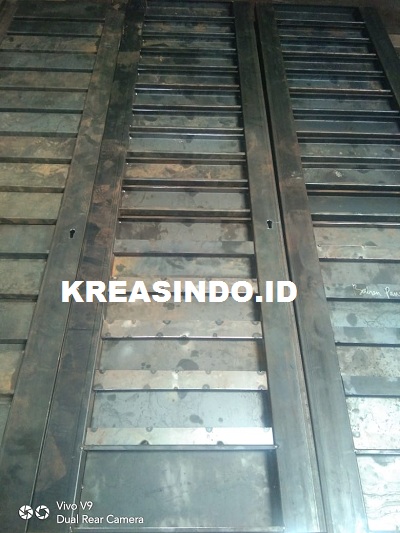Pintu Garasi Besi pesanan Bu Dewi di Perumhan Bona Indah Lebak Bulus Jakarta Pintu Garasi Besi pesanan Bu Dewi di Perumhan Bona Indah Lebak Bulus Jakarta