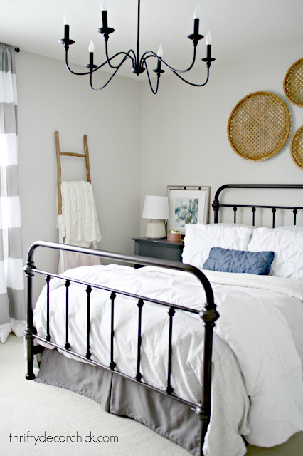 farmhouse bedroom with metal bed