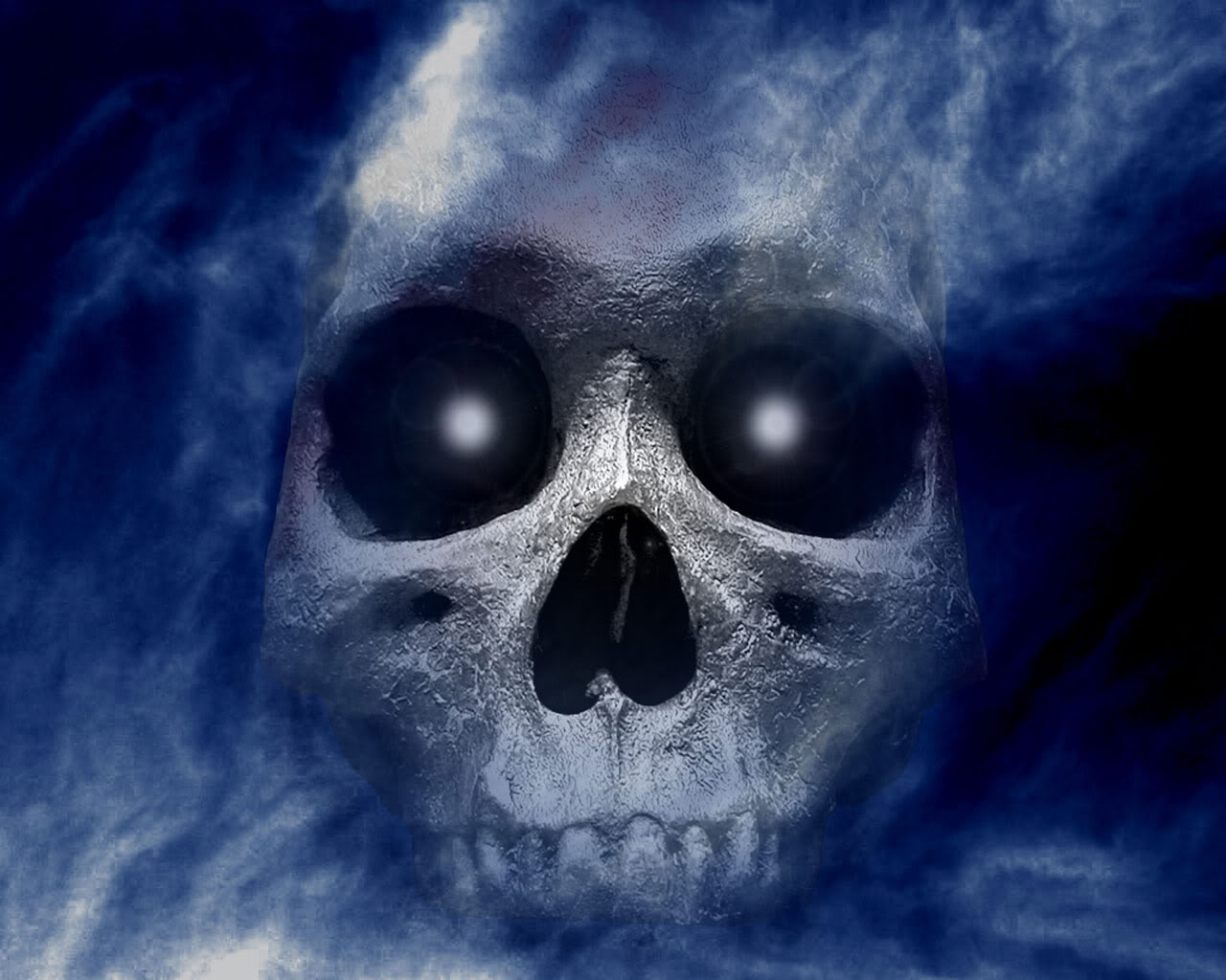 http://1.bp.blogspot.com/-676XjEl3CBo/UFx_Nu9Ma6I/AAAAAAAAAJU/DRv2B_IOJtA/s1600/halloween-skull-wallpaper.jpg