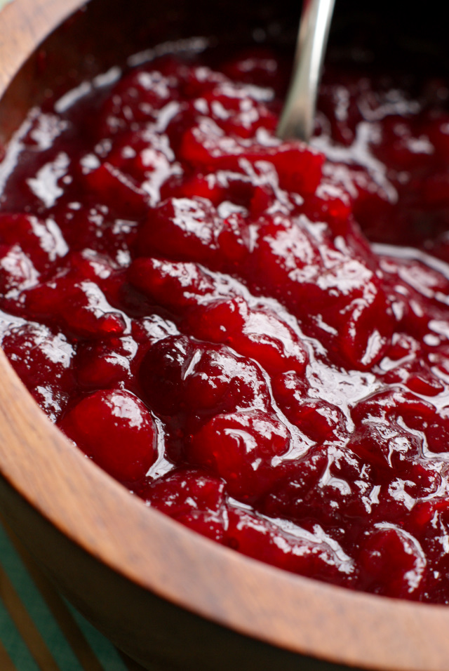 This easy to make Homemade Cranberry Sauce made from whole cranberries is so bright, fresh, and full of flavor that you will never want to buy cranberry sauce in a can again! #Thanksgiving #sidedish #cranberries