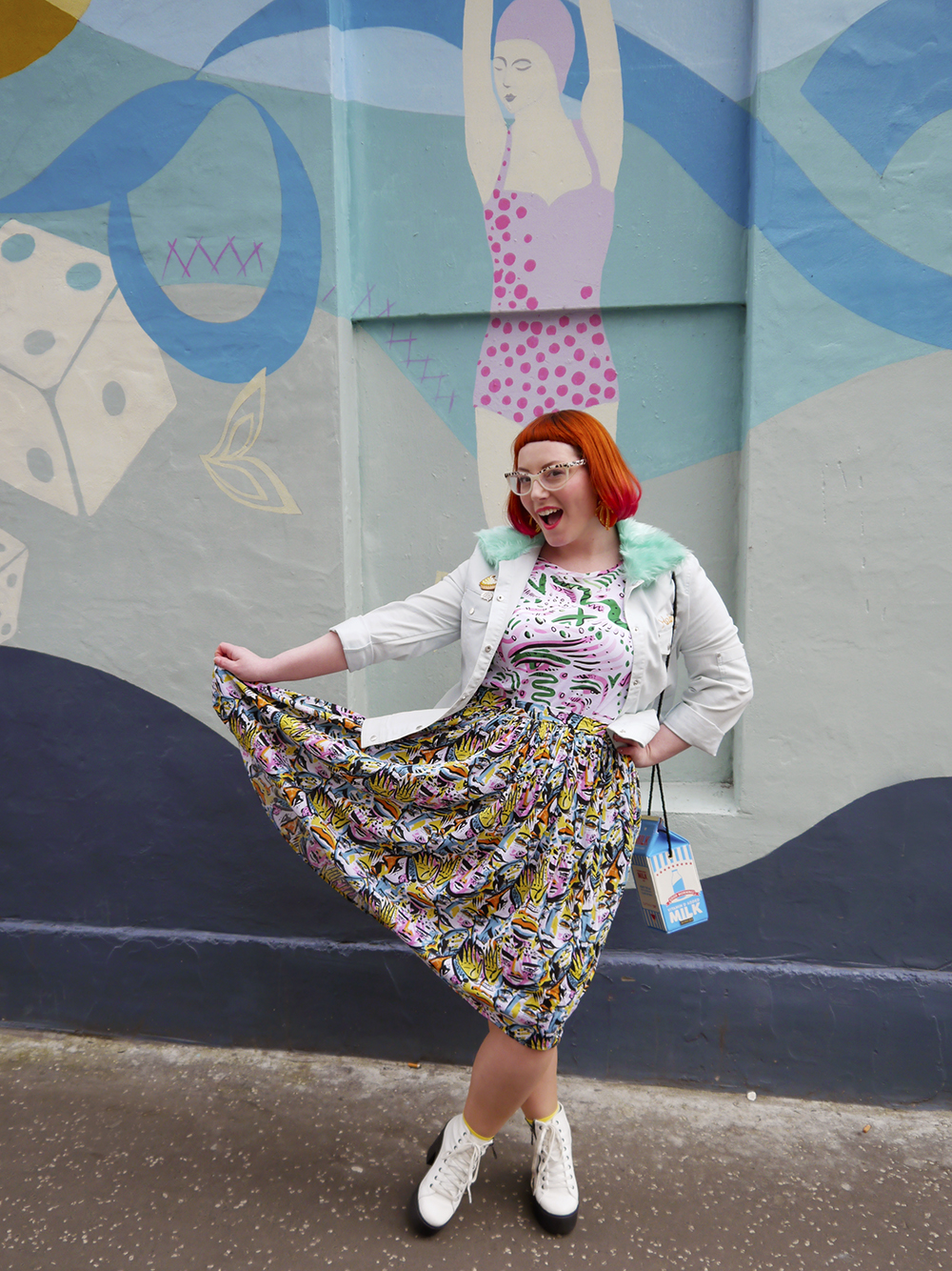 Colourful Edinburgh Wall Art and a Colourful Outfit to Match Styled by Helen, Wardrobe Conversations, Scottish Blogger, Edinburgh Blogger, Dundee Blogger, red head, ginger bob, Spex Pistols glasses, leopard print glasses, customised denim jacket, mint fur collar, Monki prints, Monki tshirt, Monki x Lynnie Zulu, Lynnie Zulu for Monki, River Island white lace up shoes, Rockcakes brooch, Rock Cakes pin badges, personalised denim jacket, Lucky Dip pins, milkshake with sprinkles, Roller Shakes, Blog Birthday, Style Diner, Kate George Mural Edinburgh, wall art Edinburgh, Edinburgh South side, Lou Taylor, tropical earrings, skinny dip london milk bag, novelty bag, milk bag