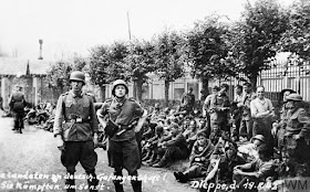 Allied prisoners under guard after the Dieppe raid worldwartwo.filminspector.com