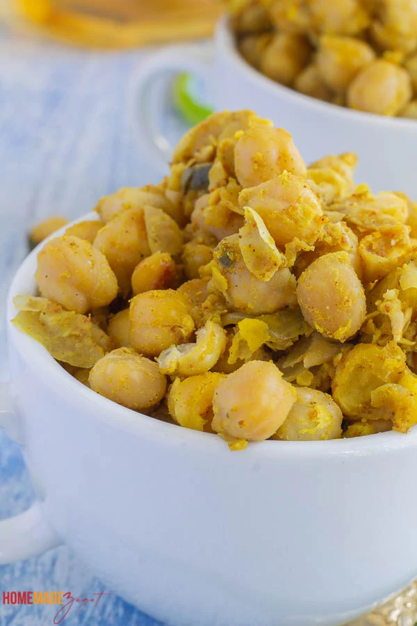 Close up of curry chicpea in a white cup