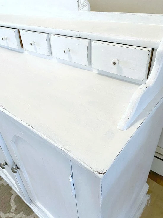 Small drawers painted white.