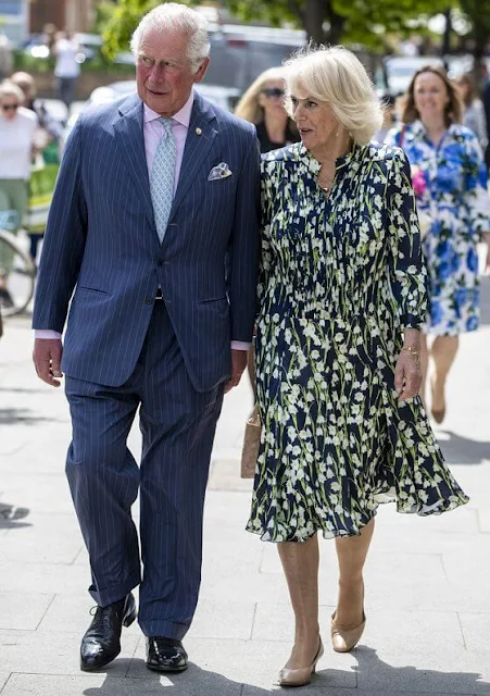 The Duchess of Cornwall wore a floral print silk dress by designer, Fiona Clare. Camilla carried for her Bottega Veneta bag