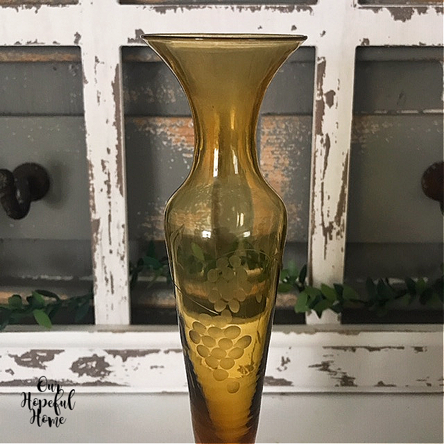 single amber glass bud vase etched grapes