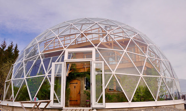 Geodesic Artic dome with a cob house inside.....
