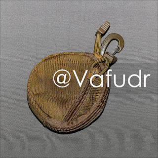 Round coin key wallet pouch with clip of tan color