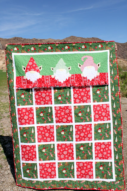 "Gnome For Christmas" is a Free Christmas Quilted Gnome Pattern designed by Carol S. from Just Let Me Quilt!
