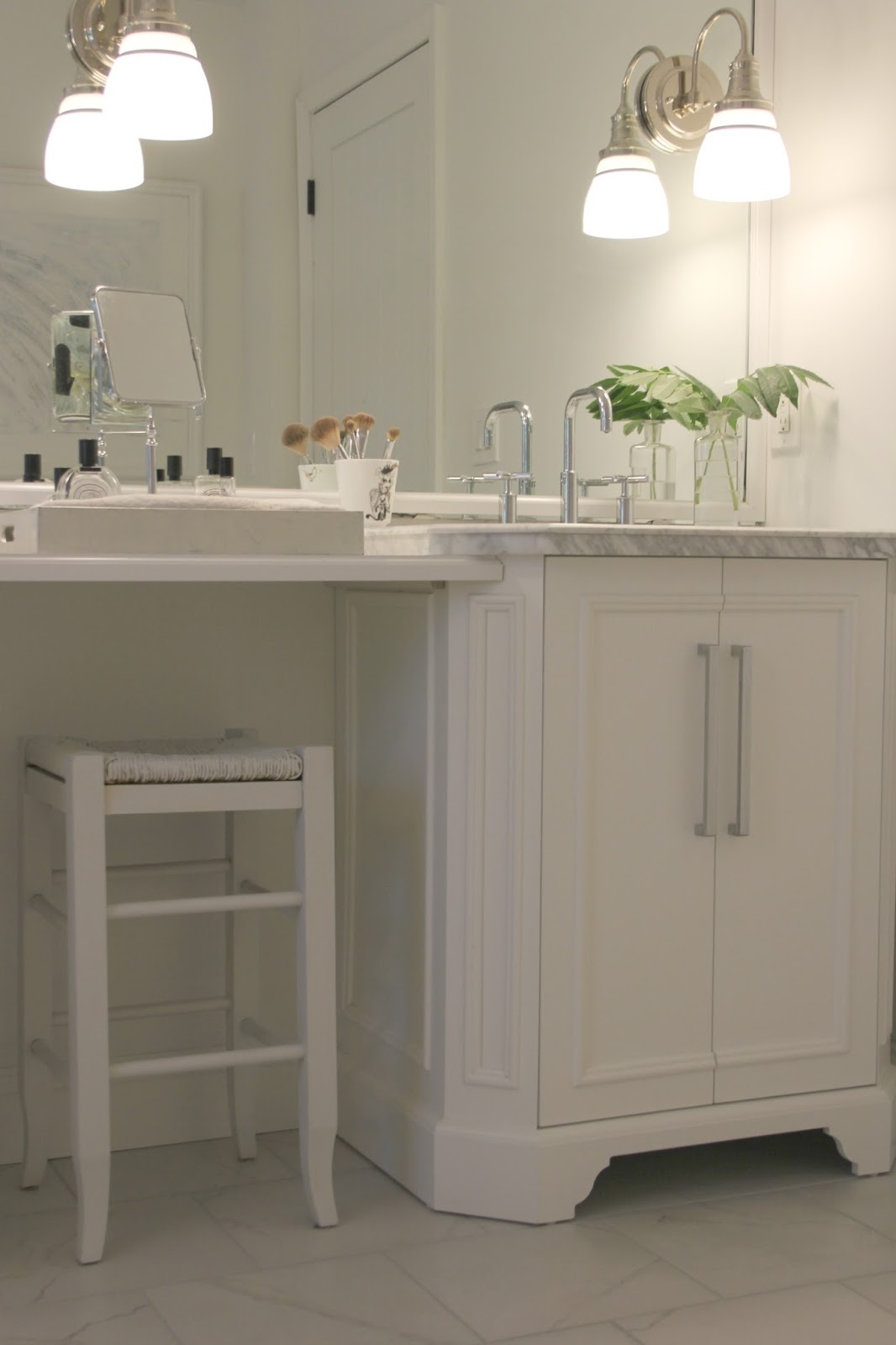 Classic white bathroom with freestanding his and hers vanities. Come be inspired on Hello Lovely by 7 Low Cost Timeless Decorating Ideas That Don't Involve the Dollar Store As Well As Photos Around My House.