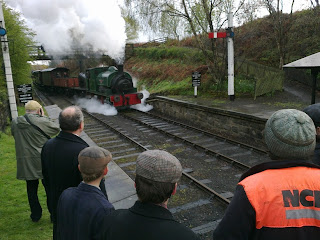 An audience watches No,6 arrive with a mixed train