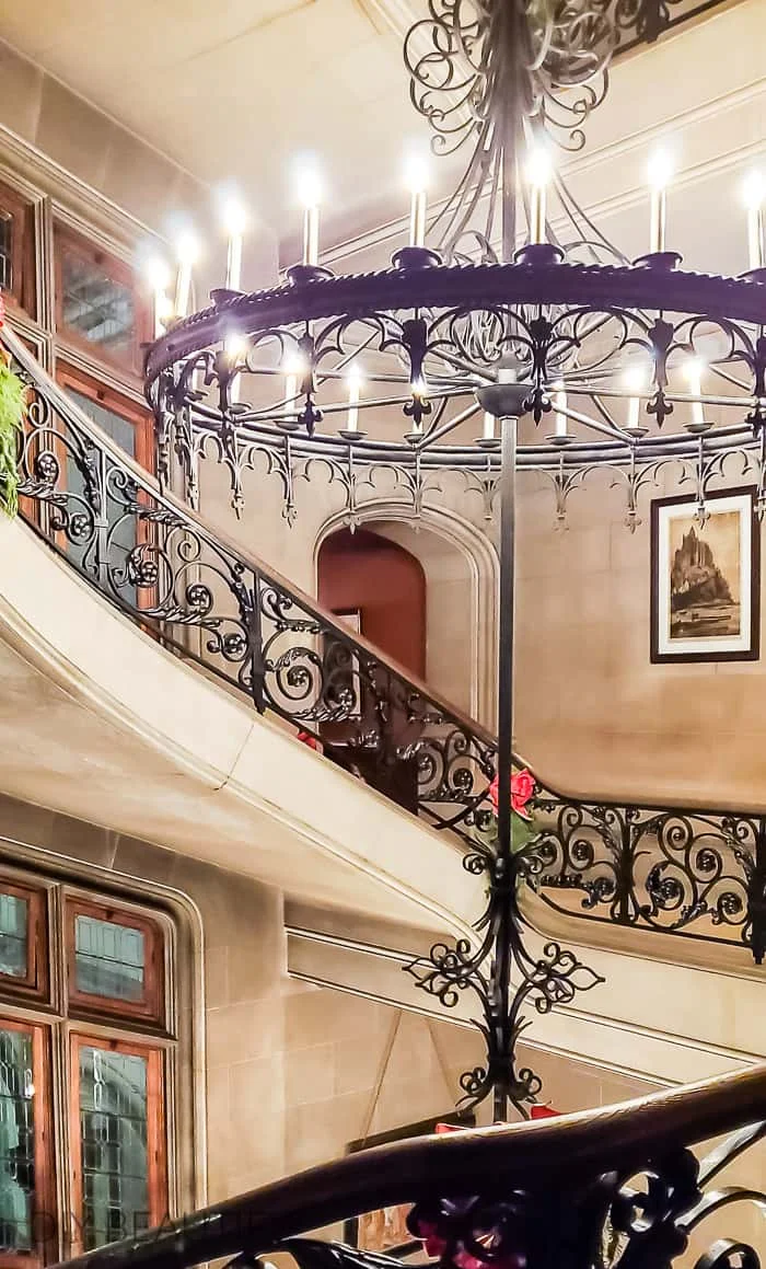 iron chandelier and staircase