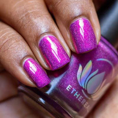 violet shimmer polish with holographic flakies on dark skin