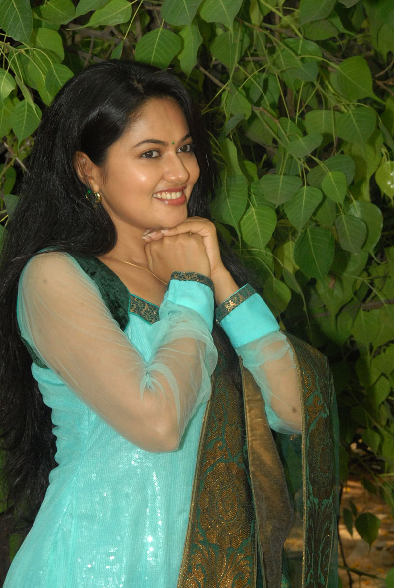 Tv Actress Suhasini Long Hair Stills In Green Dress