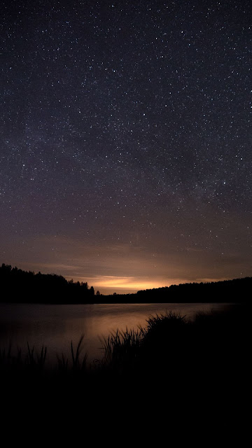 Screen background.  Evening night sky, stars, lake, sunset