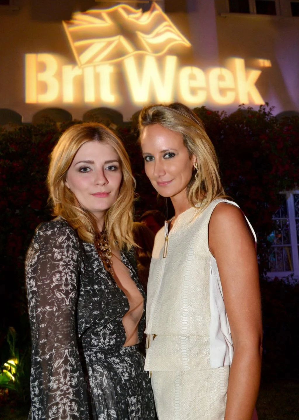 Mischa Barton wears a plunging dress to the 2014 BritWeek Launch Party