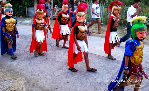Kids wearing masks as Morions participating in street procession during the Moriones Festival