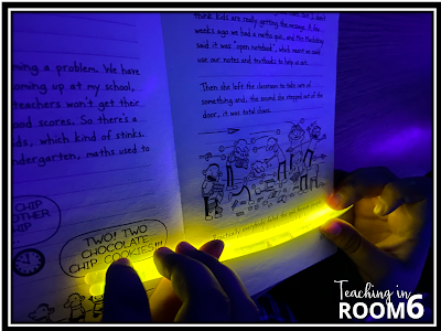 Using glow sticks to silently read is a good way to get the kids to read under black lights with some added lumination.