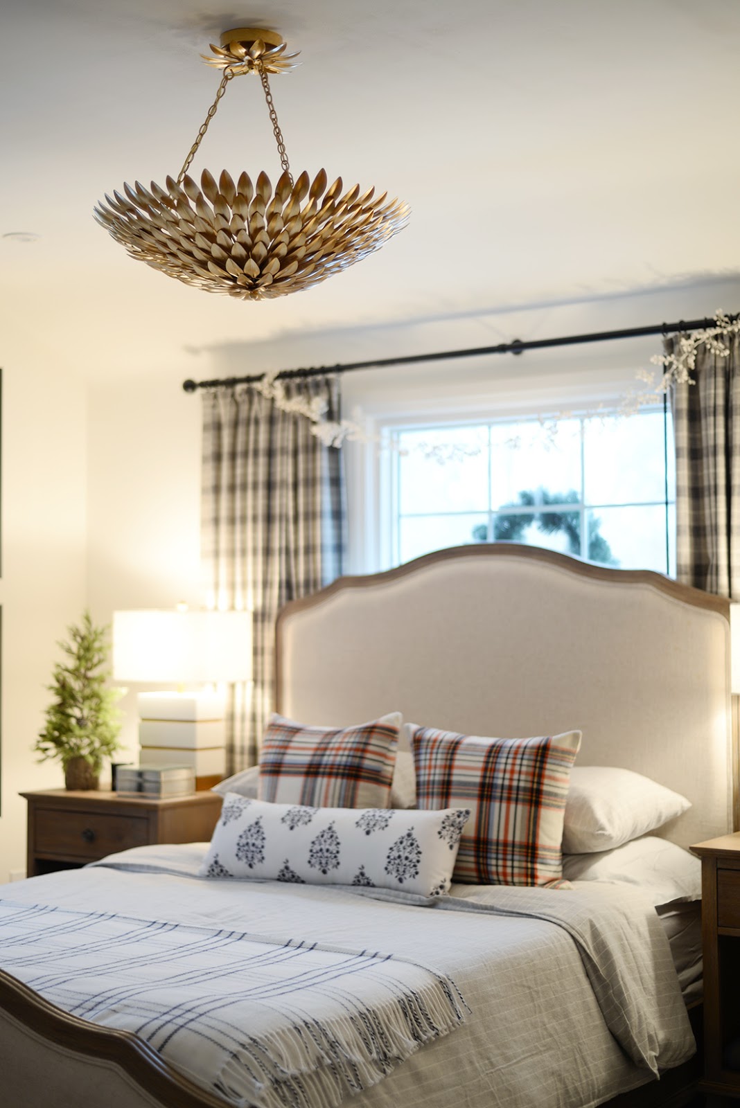 plaid curtains, plaid pillows, stiped flannel bedding, windpane blanket, wreaths in windows
