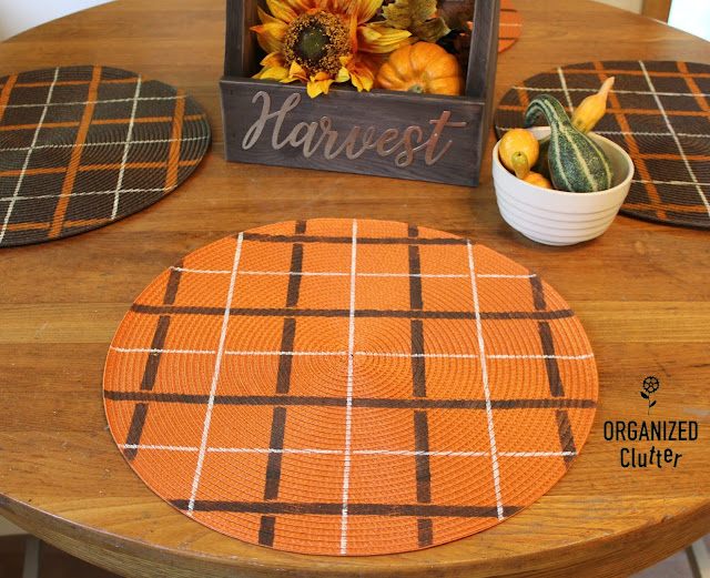 Stenciling Fall Colored Dollar General Placemats with Plaid Shirt #oldsignstencils #stencil #falldecor #placemats #dollargeneral