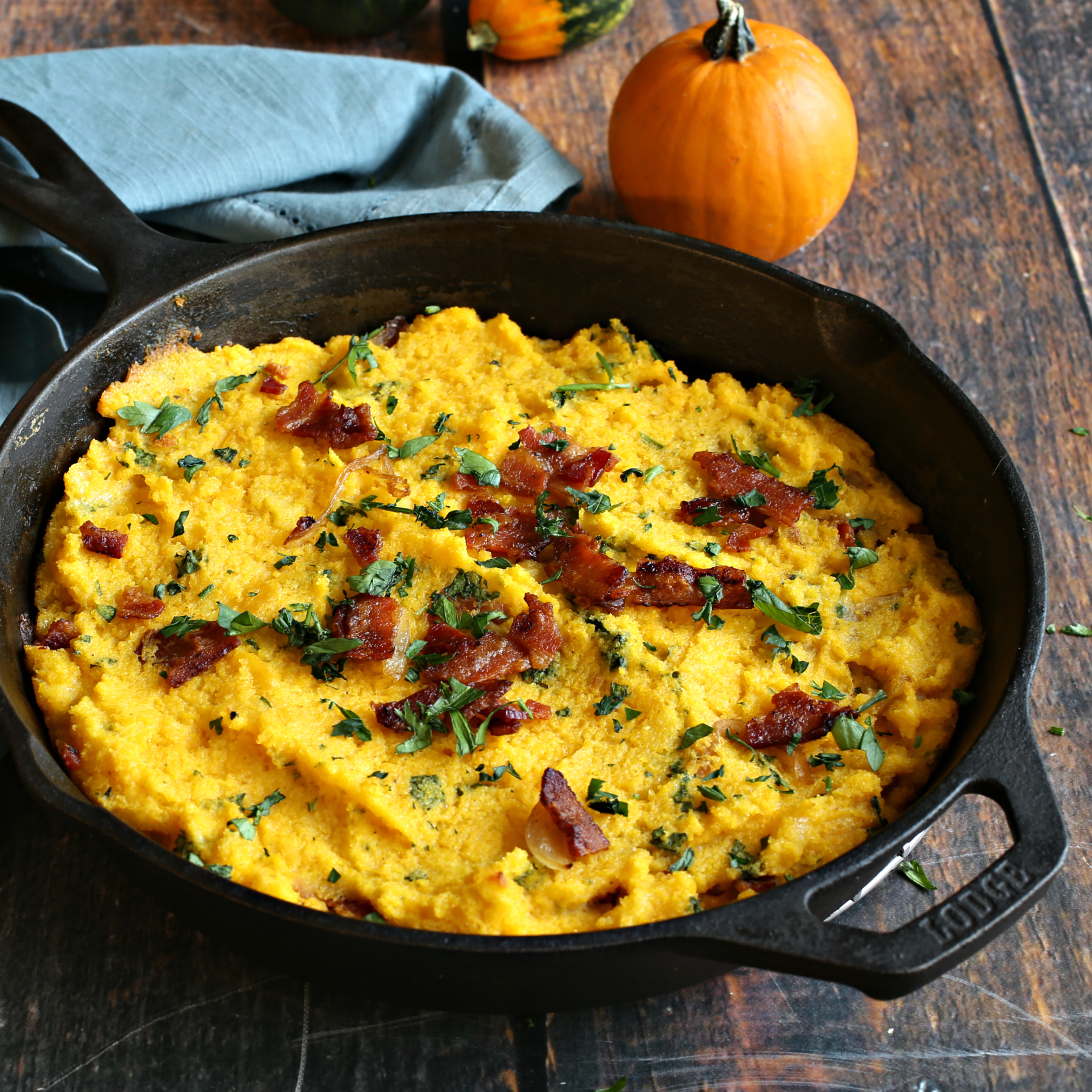 Recipe for a side dish of creamy baked cornmeal with bacon and cheese.