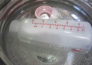 Sterilize Plastic Baby Bottles and Nipples in boiling water