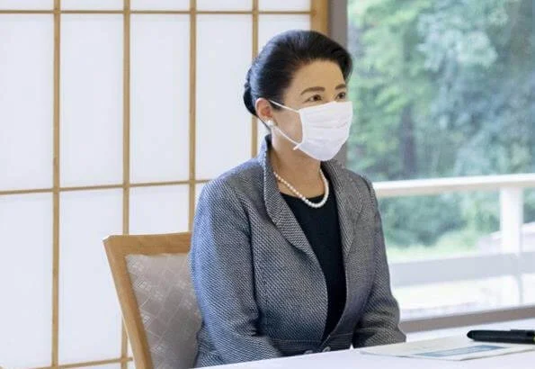 Empress Masako wore a tweed blazer and wool skirt