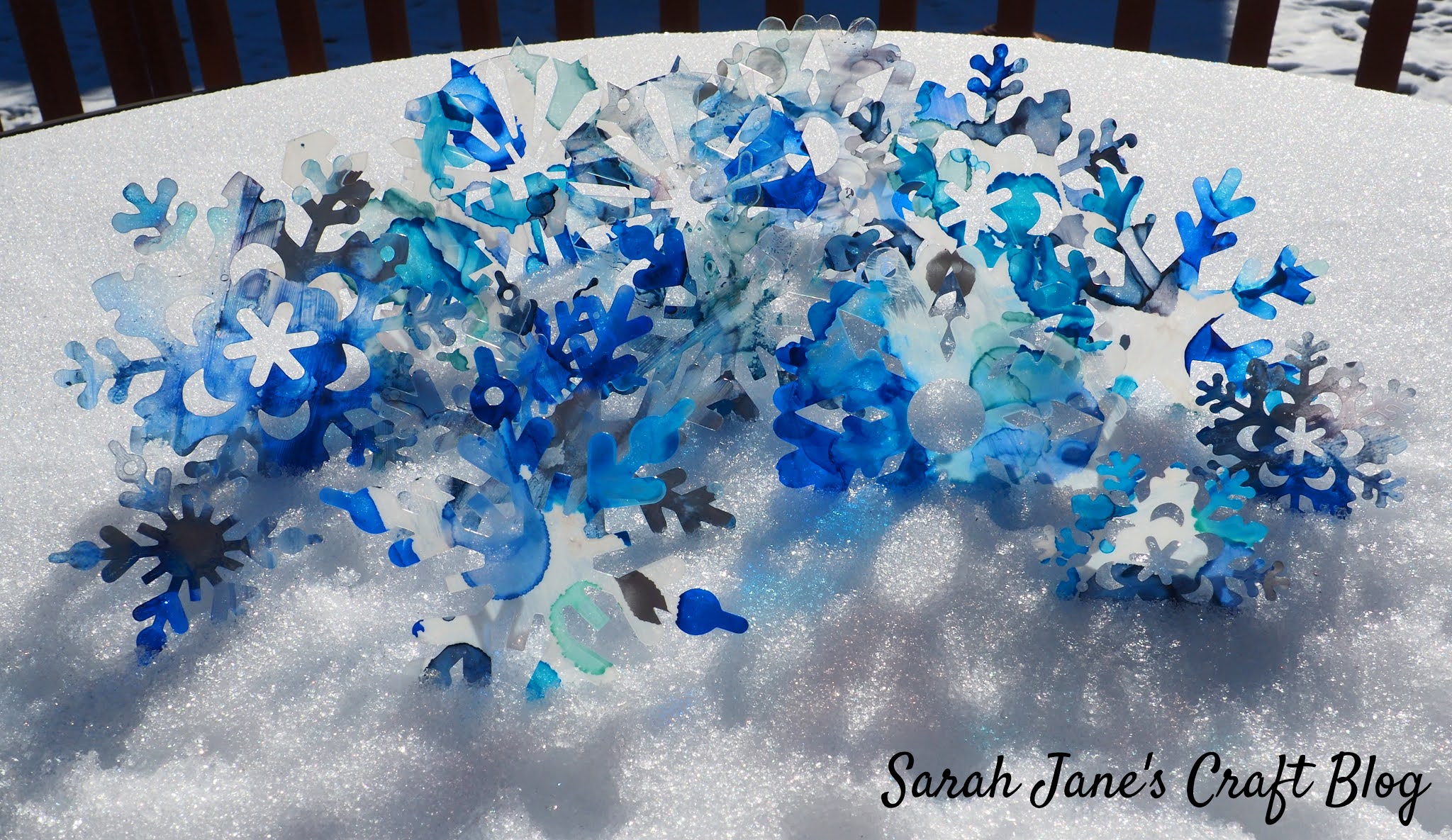 Snowflake Suncatchers from Alcohol Ink on Laminating Pouches