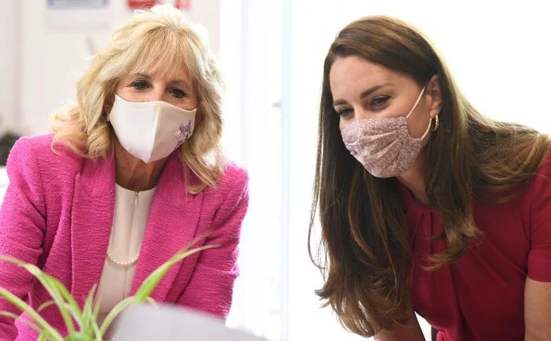 Kate Middleton wore a new midi pencil dress from Alexander McQueen. US First Lady Jill Biden wore a pink tweed blazer from L'agence