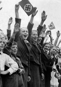 Women cheering Hitler in Czechoslovakia worldwartwo.filminspector.com