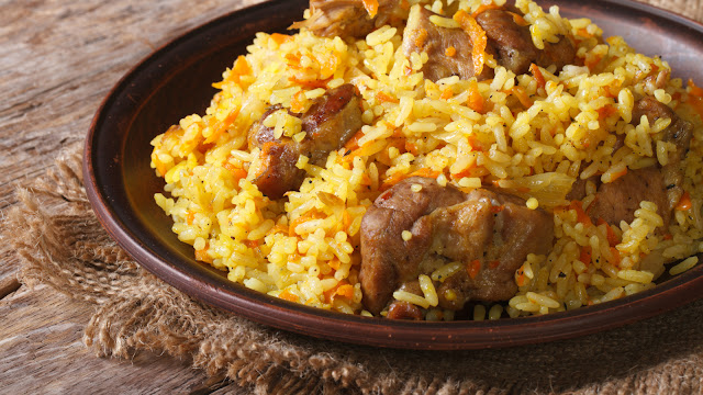 Try the favourite local food: plov
