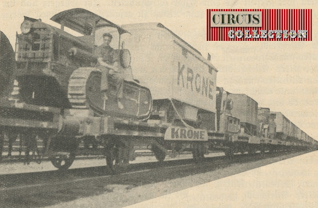 roulottes et tracteur a chenilles sur le train du cirque Krone 