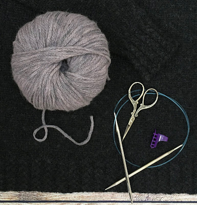 Knitted Nordic pullover with DROPS Sky yarn, addi knitting needles, scissors, and a knitting guide