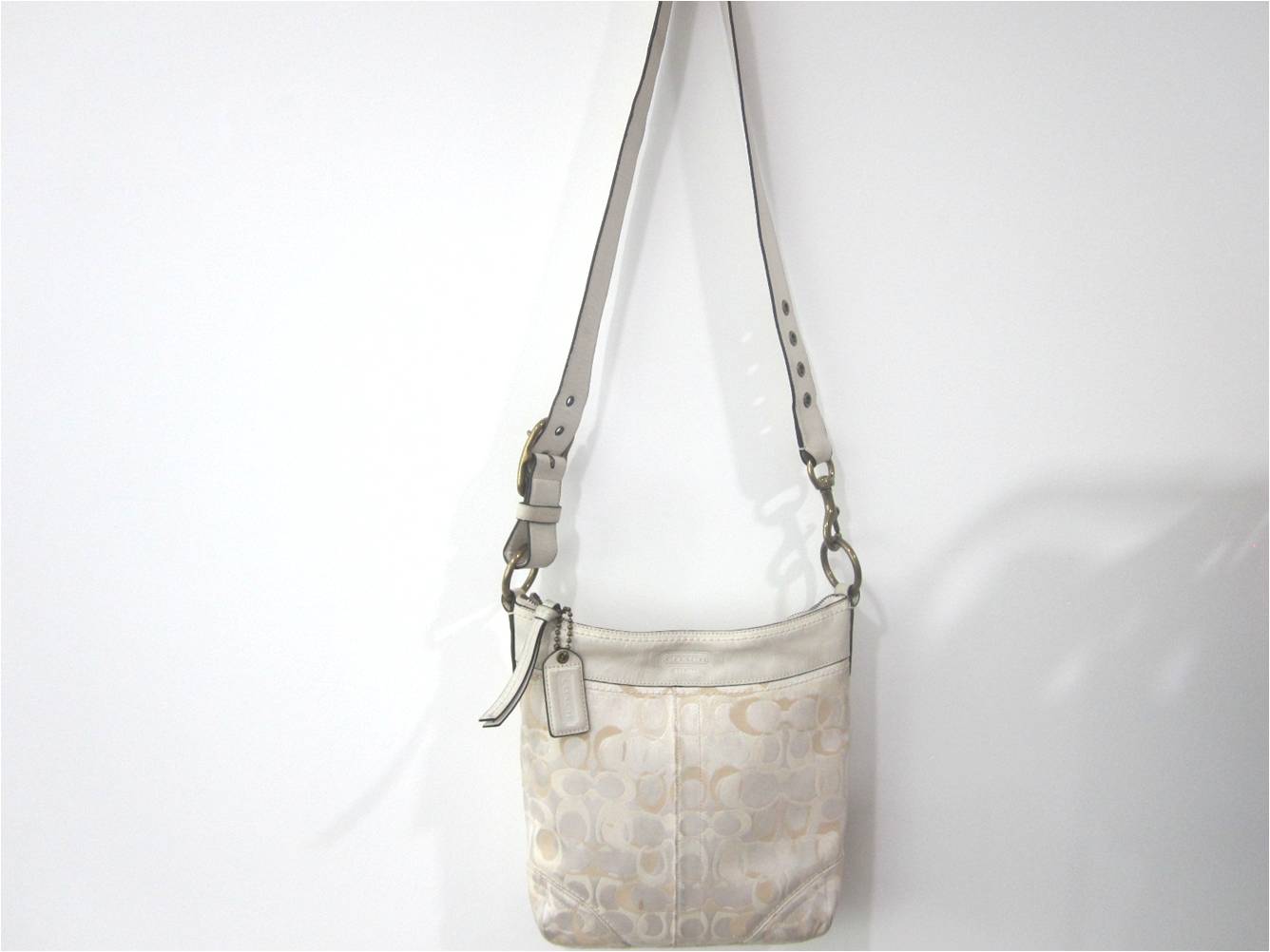 The Bags Affairs Satisfy your lust for designer bags COACH CREAM