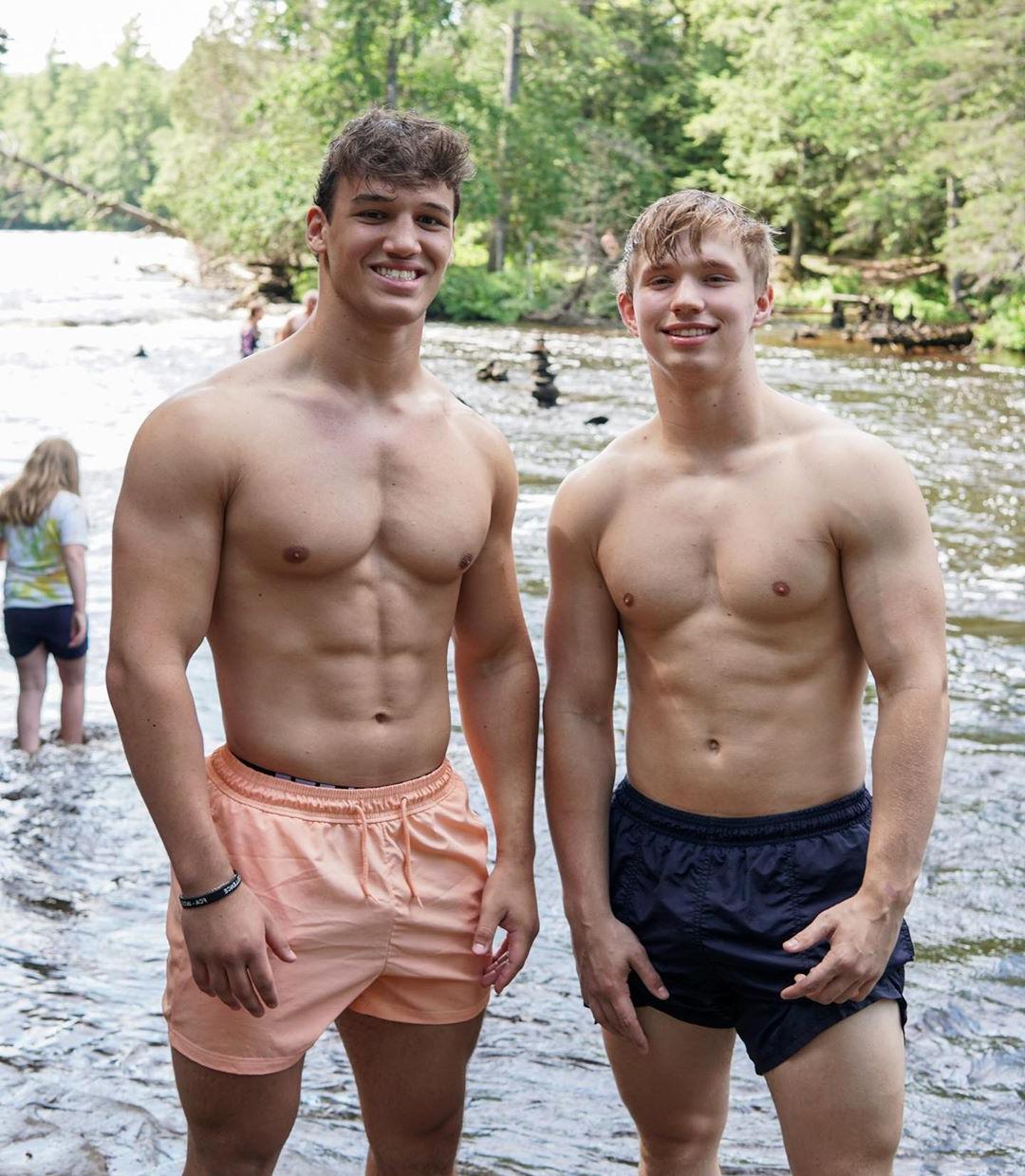 two-shirtless-bros-smiling-best-buddies-river-adventure-beefy-young-muscular-teen-male-bodies
