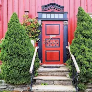 Red and blue door in Bakklandet in Trondheim Norway