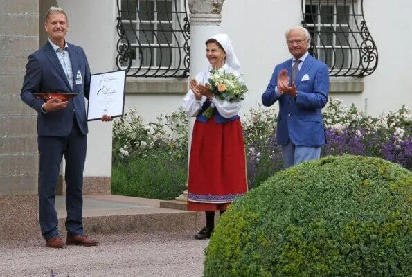 Solliden Palace in Öland. Queen Silvia is wearing a traditional local costume of Oland