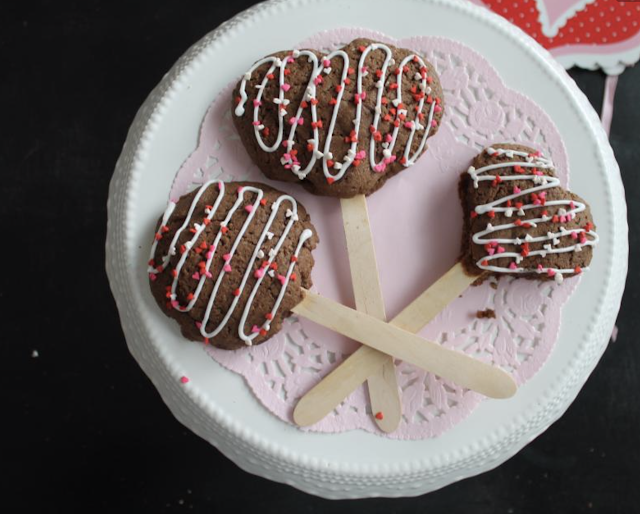 Chocolate heart cookies on a stick @www.thecookiecouture.com