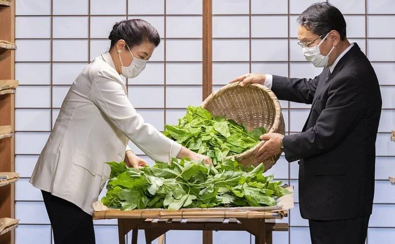 Empress Masako wore an ivory blazer and black pants to attend a sericulture ritual at the Imperial Palace in Tokyo