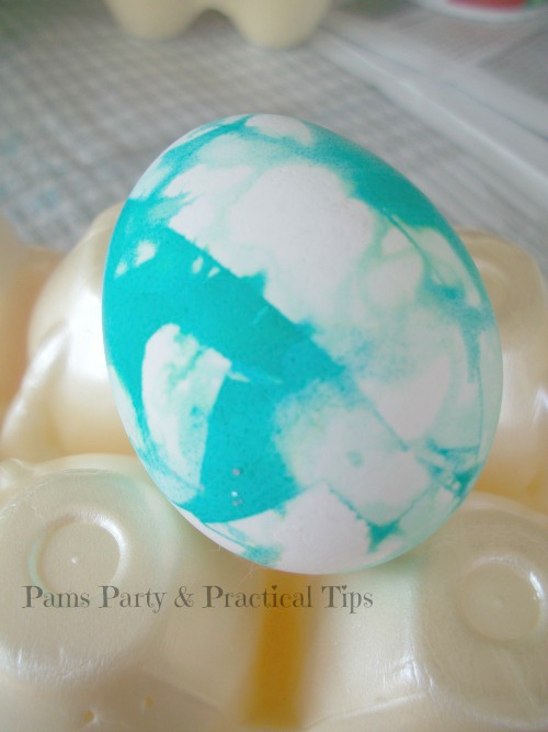Use tape on egg for a marble effect 