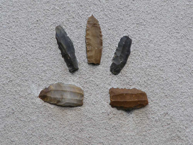 Neolithic flint cores used to make blades, decorating a house.  Indre et Loire, France. Photographed by Susan Walter. Tour the Loire Valley with a classic car and a private guide.